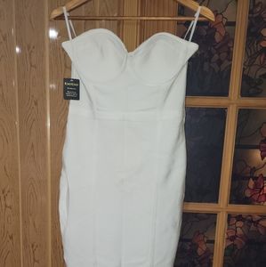 White dress, SZ Large, brand new BeBe Strecht, strapless with straps included...